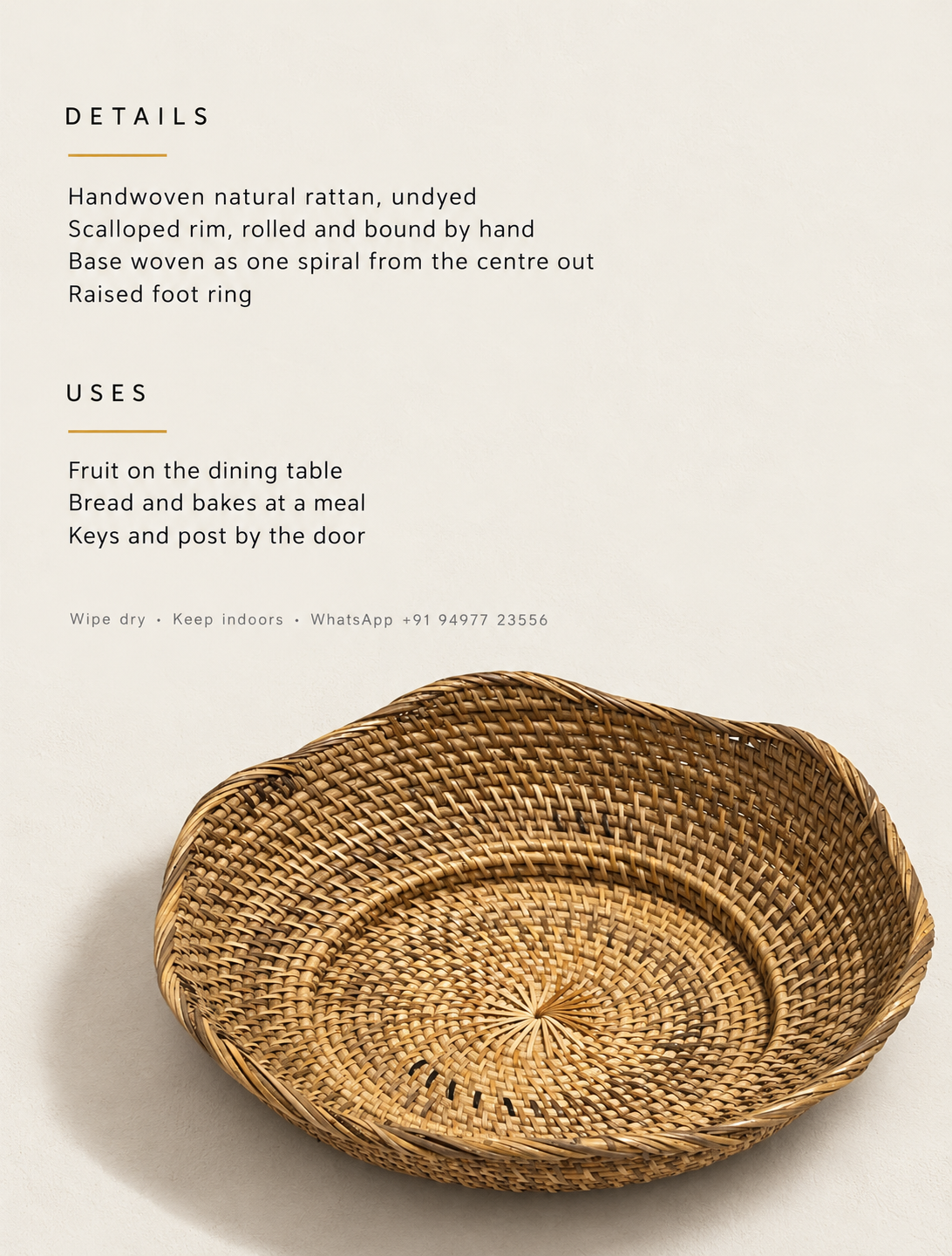 A shallow round bowl in undyed rattan, woven as one spiral from the centre out.